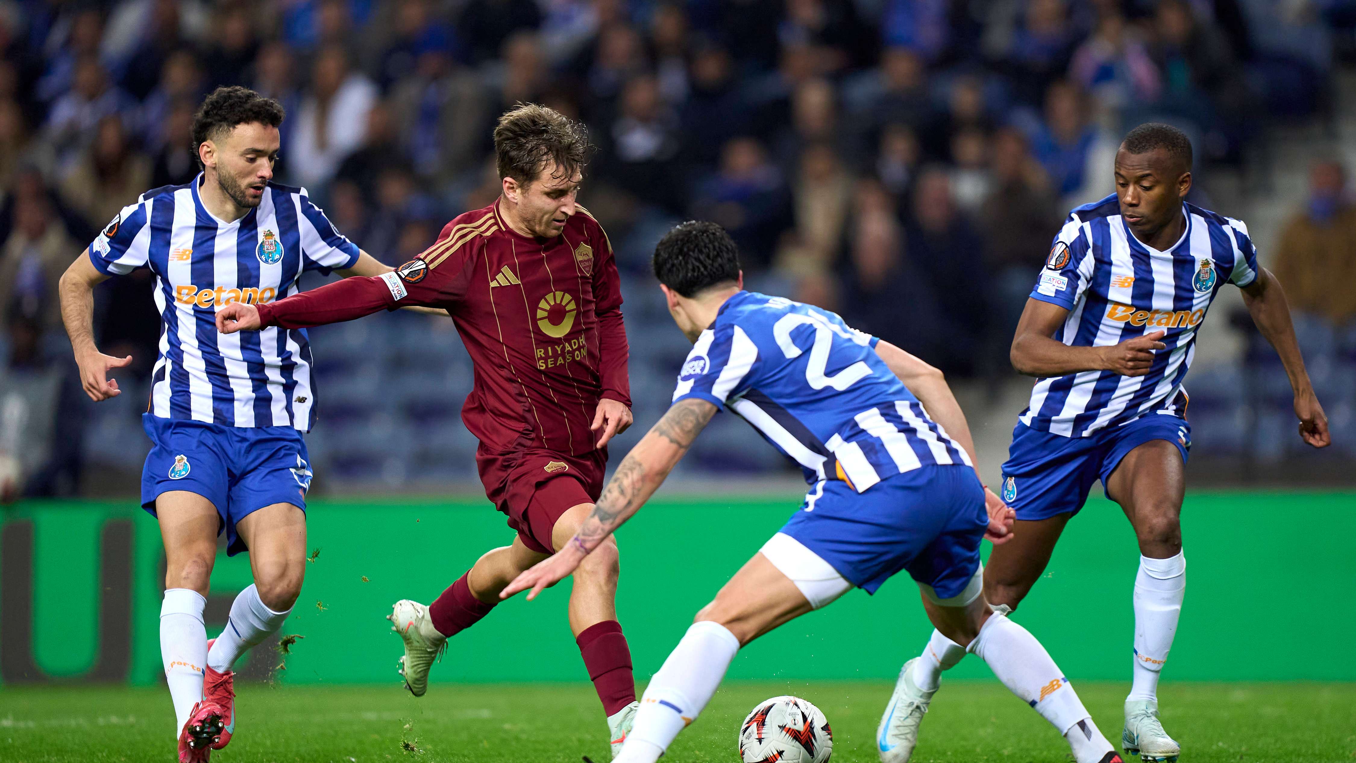 Joao Mario (L), Nehuen Perez (C) and Tiago Djalo (R) of FC Porto