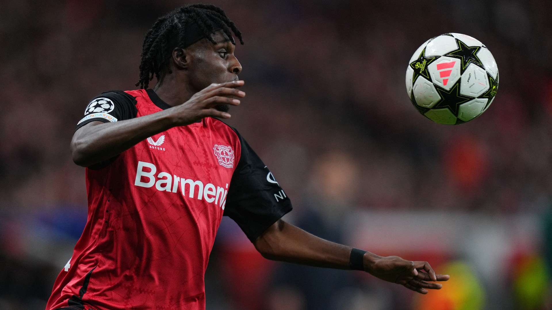 Bayer Leverkusen's Dutch defender #30 Jeremie Frimpong controls the ball 